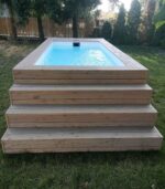 PISCINA CONTENEDOR CON REVESTIMIENTO DE MADERA - Imagen 2