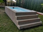 PISCINA CONTENEDOR CON REVESTIMIENTO DE MADERA - Imagen 3