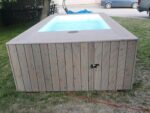 PISCINA CONTENEDOR CON REVESTIMIENTO DE MADERA - Imagen 4